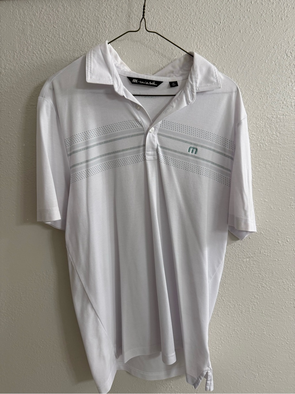 Travis Mathew White Polo with Gray Stripe Detail